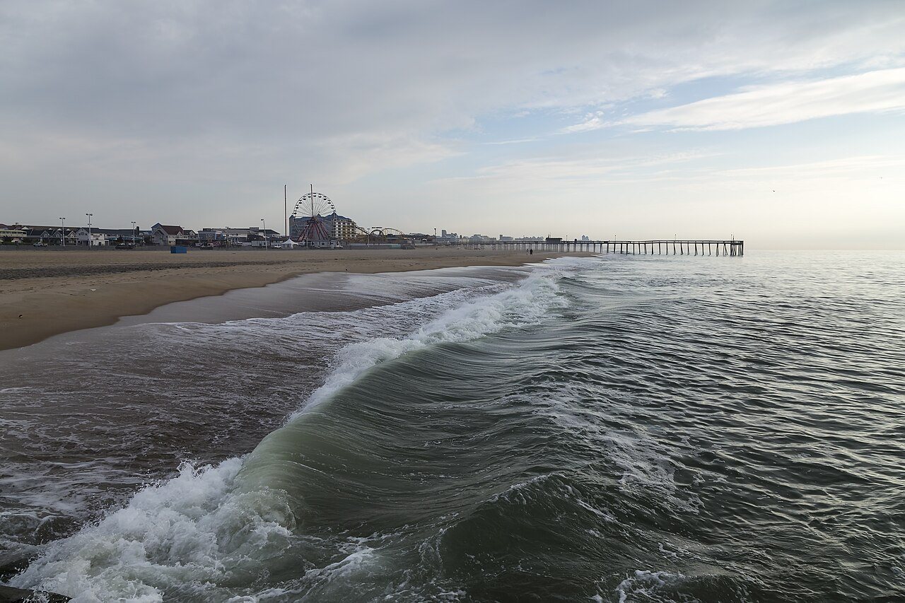 Ocean City beach, fishing pier and Ferris wheel in soft morning light